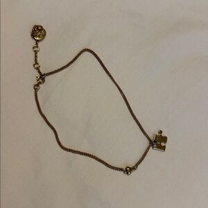 Juicy couture Gold Puzzle Charm necklace for girls